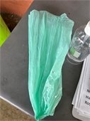 green plastic bag